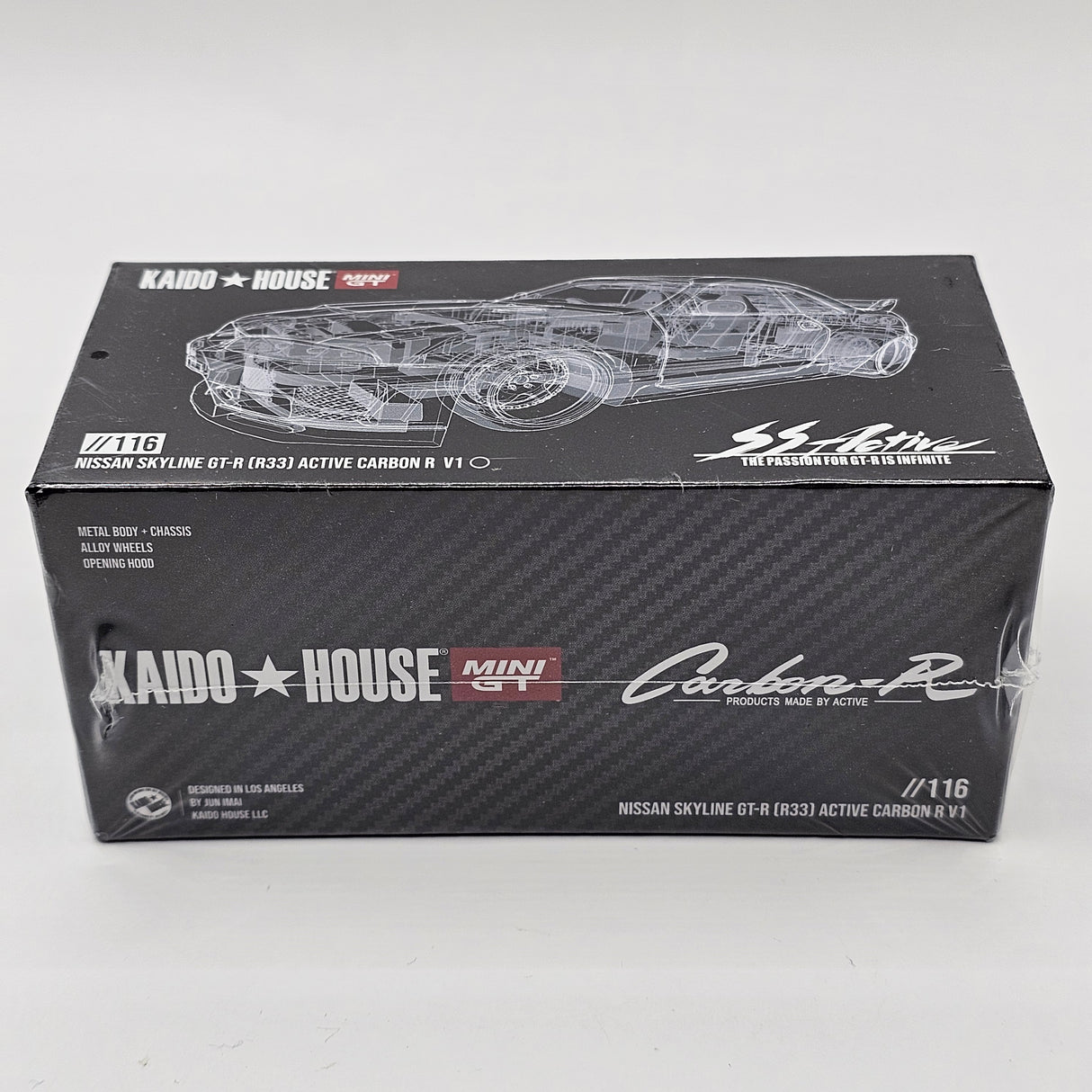 Mini GT x Kaido House Nissan Skyline GT-R (R33) Active Carbon R 1/64 Scale MGTKHMG116