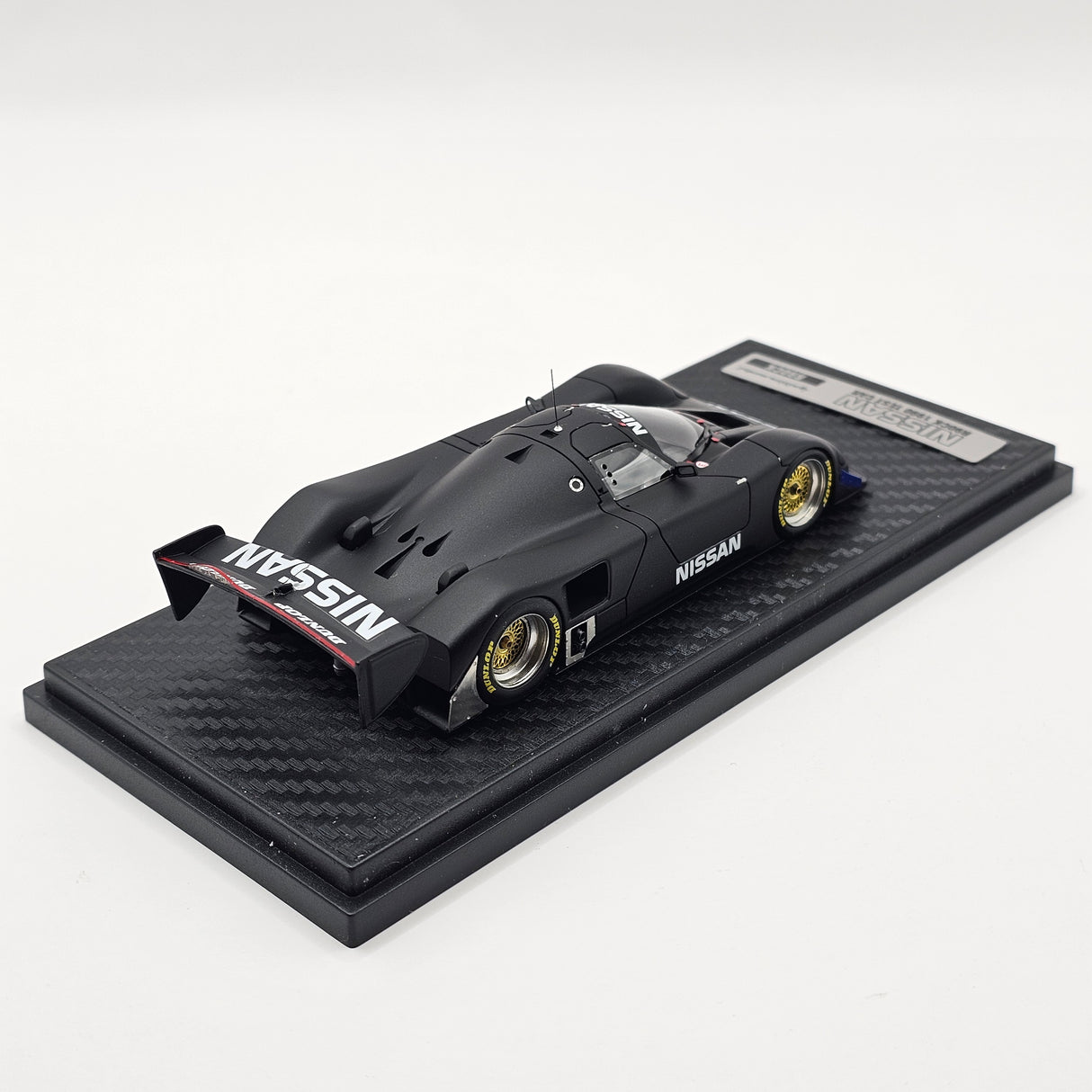 Ignition Model Nissan R90CK 1990 Test Car Black 1/43 Scale - Damaged Wing