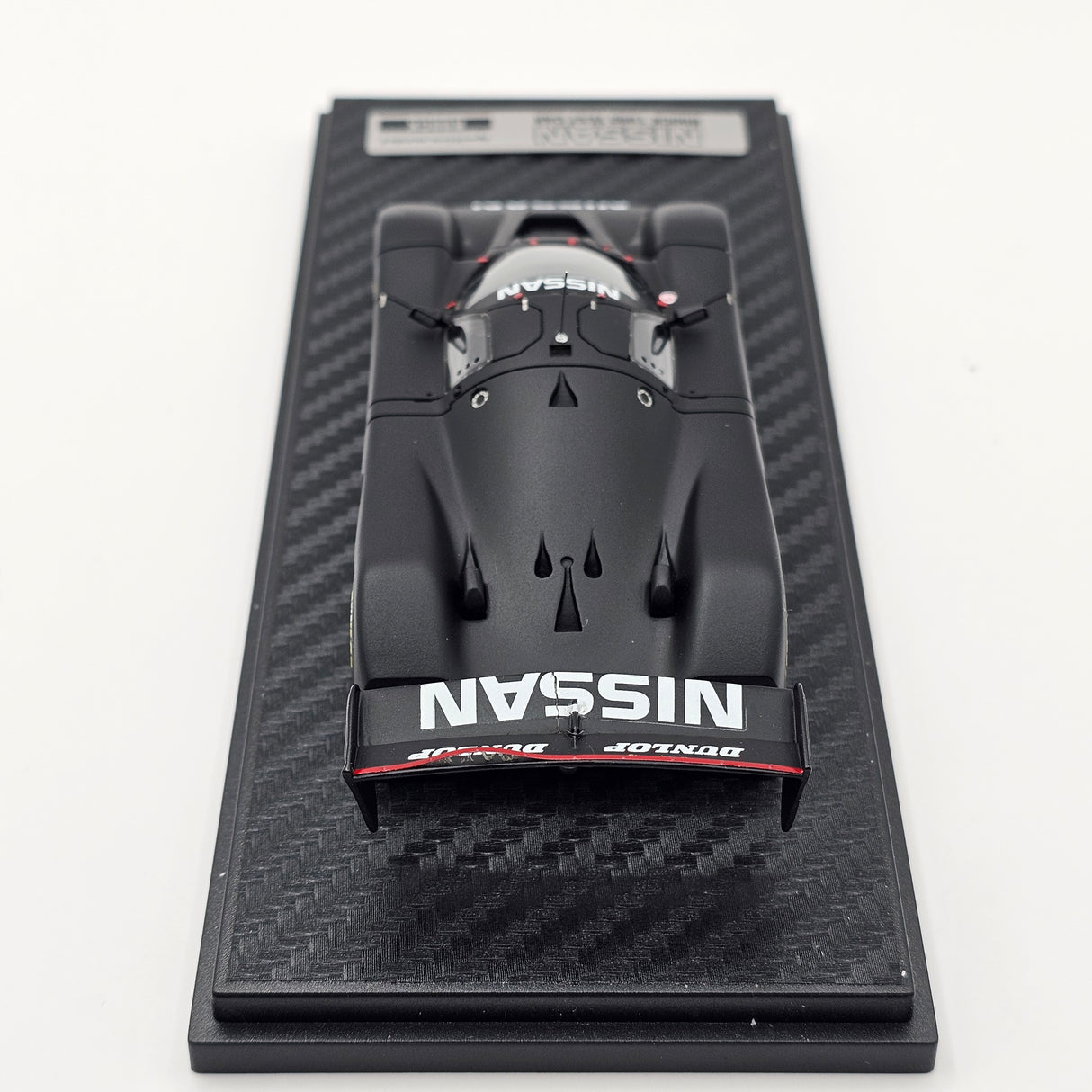 Ignition Model Nissan R90CK 1990 Test Car Black 1/43 Scale - Damaged Wing
