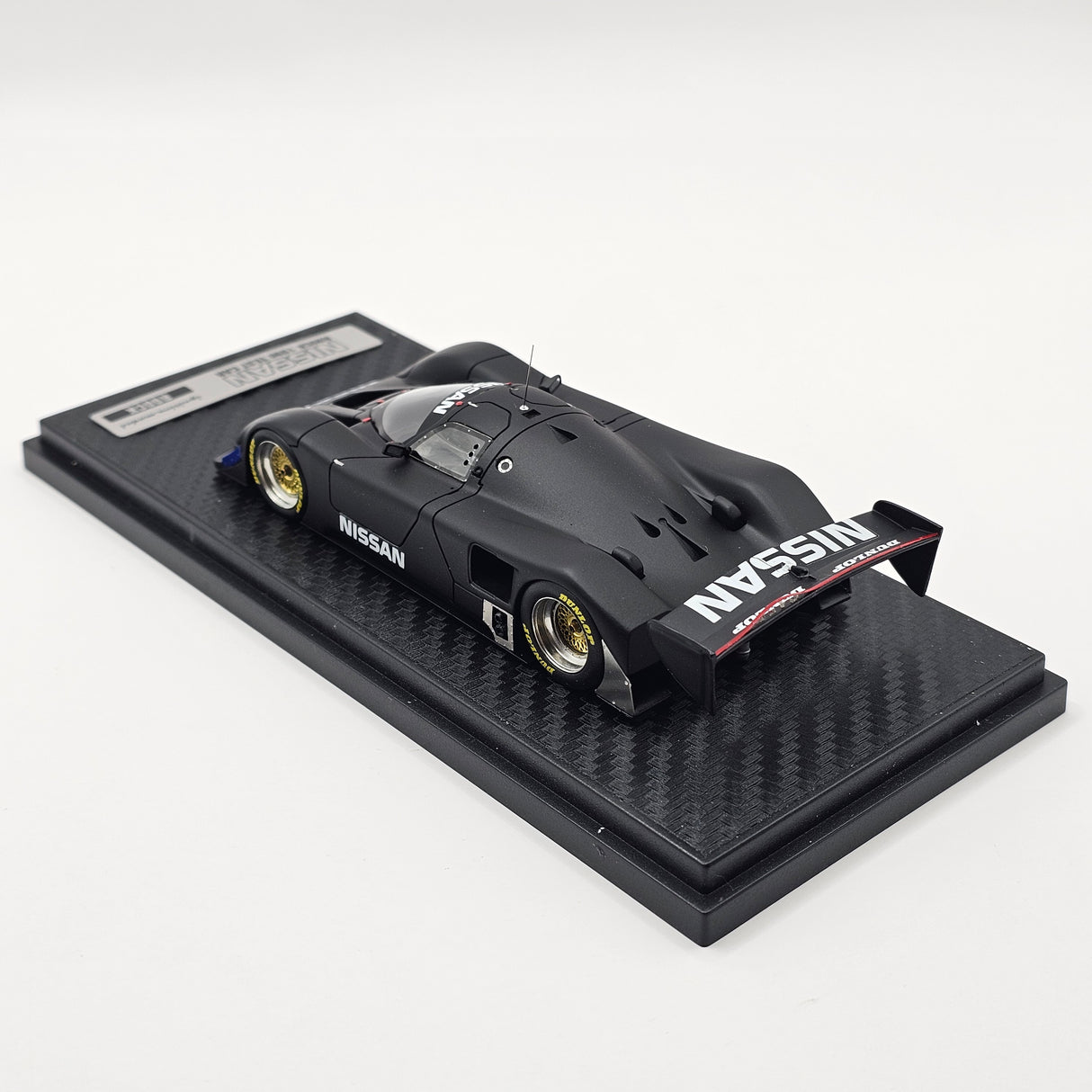 Ignition Model Nissan R90CK 1990 Test Car Black 1/43 Scale - Damaged Wing