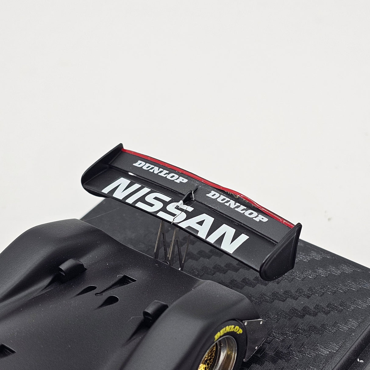 Ignition Model Nissan R90CK 1990 Test Car Black 1/43 Scale - Damaged Wing