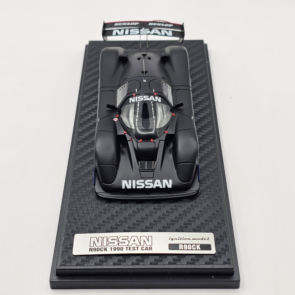Ignition Model Nissan R90CK 1990 Test Car Black 1/43 Scale - Damaged Wing