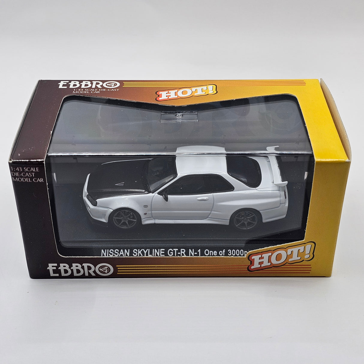 EBBRO Nissan Skyline GT-R R34 V-Spec II N1 White w/ Carbon Bonnet 1/43 Scale